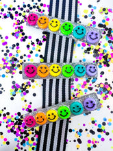 Load image into Gallery viewer, Neon Rainbow Smiley Face Clip

