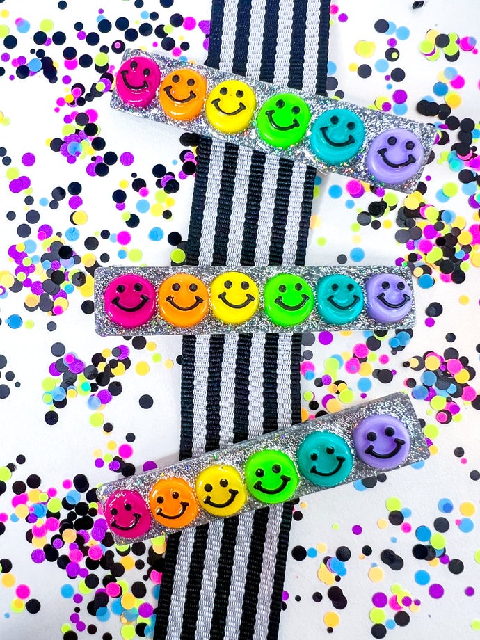 Neon Rainbow Smiley Face Clip